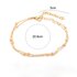 Multilayer enkelbandje gouden balletjes
